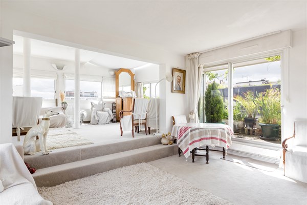 split level living room with terrace view